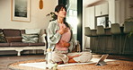 Yoga, breathing and woman in lounge with tablet, align chakra and online tutorial for tips. Meditation, mature person and technology in home for wellness, holistic healing and calm with relax