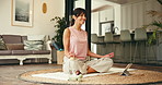 Yoga, breathing and woman in home with tablet, align chakra and online tutorial for tips. Lotus pose, mature person and technology in living room for wellness, holistic healing and calm with smile