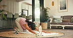 Woman, stretching and yoga for fitness at house with training, spiritual wellness and body balance. Person, warm up and forward bend for flexibility, core strength and holistic healing in living room