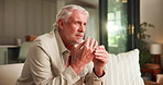 Home, thinking and senior man with ring for marriage crisis, divorce doubt or regret decision. Reflection, person and marital problem with wedding band, fidget and separation anxiety in retirement