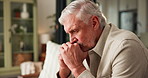 Sad, old man and thinking in house with mental health reflection, memory loss and contemplation. Thoughtful, retirement and senior person with depression, grief and dementia in home living room.
