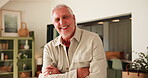 Arms crossed, face and laughing with senior man in living room of home for comedy or wellness. Break, funny and retirement with happy old person in apartment for chilling, free time or humor