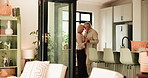 Love, senior couple and dance in kitchen for anniversary celebration, holding hands or spin. Music, elderly man and woman moving in home with energy, romance or happiness in retirement with flare