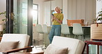 Home, funny and old woman in lounge, smartphone and app for communication, humor or internet. Smile, pensioner and mature person with cellphone, retirement and online joke with network and laughing