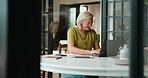 Thinking, home and mature woman on laptop for remote work, planning and article research. Creative freelancer, house and person on computer for typing news story, editing report and website content