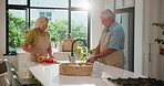 Home, cooking and old couple in kitchen, vegetables and bonding together with recipe. Apartment, pensioner and healthy man with woman, relationship and ingredients with food, meal prep and nutrition