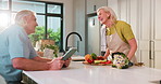Cooking, tablet and mature couple in home with online recipe for dinner, supper and cuisine. Marriage, kitchen and man with woman on tech for video, food tutorial and culinary guide with ingredients