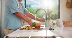 Hygiene, cooking and man washing hands in kitchen for germ protection, wellness and safety. Faucet, mature person and cleaning by tap water for disinfection, bacteria prevention and meal prep in home