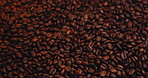 Above, spinning and roasted beans for coffee production, sustainable granules and aroma development. Motion, caffeine and fresh brew with bold taste, rich flavor and supply chain process for espresso