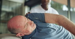 Physiotherapy, help or senior man in house with stretching, mobility or checkup in rehabilitation. Healthcare, retirement and coach in home with strain, injury or pain prevention in body assessment.