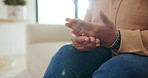 Hands, massage and carpal tunnel on sofa in home with joint pain, ache and stress in living room. Person, arthritis and inflammation with fatigue, sore or tendinitis on couch with burnout at house