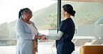 Elderly care, nurse and old woman holding hands for support, empathy or comfort in nursing home. Homecare, senior person and caregiver together for healthcare, counseling or kindness in clinic