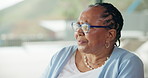 Senior black woman, thinking and relax in home with reflection, nostalgia and glasses in retirement. Elderly African person, perspective and remember with insight, decision or daydream at apartment