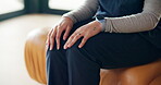 Hands, nervous nurse and woman with anxiety in home for medical mistake, worry or workload pressure. Caregiver, stress and person waiting for healthcare outcome, challenge and fidget legs in lounge