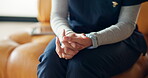 Nervous, hands and woman with anxiety on sofa for EAP counseling appointment, advice and support. Psychology, nurse and person with work stress on couch for therapy consultation, help and wellness.