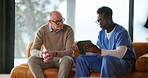 Nurse, senior man and discussion with tablet on sofa for healthcare, communication or consultation in home. Caregiver, advice and talking to mature person for help, support and medical results