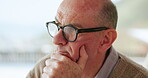 Thinking, senior man and glasses at house with vision, depression and remember past memory. Thoughts, elderly person and reflection on mental health, dementia and daydreaming of retirement loneliness