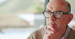 Thinking, senior man and serious at house with vision, depression and remember past memory. Thoughts, elderly person and reflection on mental health, dementia and daydreaming of retirement loneliness
