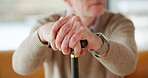 Hands, cane or old man with disability in retirement home for injury, healthcare or support. Osteoporosis, patient or senior person with walking stick in nursing house for help, mobility or recovery.
