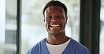 Face, nurse and man with smile, hospital and happy for career development in healthcare or wellness. Confident, medical professional and black person with commitment for health services in Nigeria