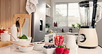 Smoothie, blender or strawberry on kitchen counter for healthy drink, nutrition or natural ingredients. Machine, diet or recipe in home with fruit shake for gut health, fiber or antioxidant benefits.