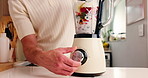 Health, blender and smoothie with hands of person in kitchen for diet, detox and nutrition. Antioxidants, breakfast and weight loss with man and drink in home for protein shake, fiber and vitamins