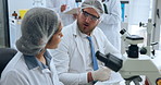 Scientist, collaboration and talk in laboratory for medical test, writing notes and study disease. Science team, discussion and people planning with microbiology, investigation and pathology research