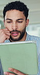 Business, man and tablet with thinking in office for proofreading blog, article review and editing. Journalism, editor and tech with stylus for fact checking, story accuracy and submission evaluation