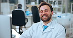 Face, scientist and man in lab, laughing or confident for pharmaceutical innovation or career growth. Happy, person and drug discovery with biotechnology, medical professional and team in clinic