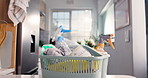 House, hygiene and basket with cleaning products, kitchen and tools for disinfection or housekeeping. Chemical, bottles and supply to remove germs on table, spray and equipment for sanitation in room
