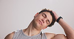 Fitness, man and neck stretching in studio for muscle relief, joint flexibility or start workout. Breathing, athlete and warm up exercise on white background for preparation, getting ready and health