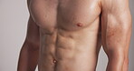 Fitness, muscle or man in studio with closeup, wellness or motivation for body transformation. Sport, shirtless or athlete on white background with abdomen, health or training results for bodybuilder
