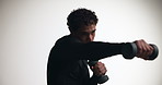Dumbbells, training and man shadow boxing for fitness, strength and workout for fight practice. Athlete, punch and person exercise with weights for muscle conditioning on white background in studio