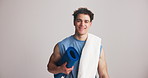 Yoga mat, fitness and face of man in studio for training, balance or exercise on white background. Pilates, portrait and happy athlete with smile for health, workout or sports routine with space