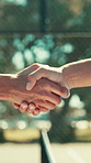 Handshake, tennis coach and people with net for fitness, support and training for contest and practice. Athlete, person and introduction with congrats, shaking hands and sports for teamwork or game