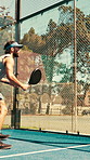 Athlete, man and serving for padel on court for match practice, game training and sports contest. Male person, swing and racket for tennis challenge, fitness tournament and technique for competition