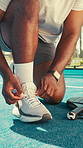 Fitness, hands and tie shoes for padel on court, tournament and start of training session. Man, tennis player and sneakers on outdoor turf for challenge preparation, sports competition and regulation