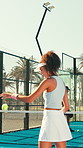 Woman, serving and ball for padel on court for match practice, game training and sports contest. Athlete, female person and racket for tennis challenge, fitness tournament and competition technique