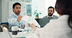 Business, people and meeting with paperwork in office for accounting, graphs and finance report. Team, explain and discussion with laptop, financial document and chart information for revenue growth