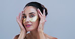 Face, beauty and woman with eye patches for anti aging, collagen treatment or dermatology. Portrait, skincare cosmetic or gold mask for detox, hydration or mature model on studio background space