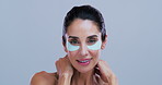 Face, skincare and happy woman with eye patches for anti aging, collagen or dermatology. Portrait, beauty cosmetic and gel pad for dark circles, hydration and mature model on studio background space