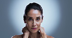 Beauty, skincare and face of mature woman for hydration, shine and glow for dermatology. Mockup space, spa and portrait of person for beauty, facial and anti aging cosmetics on studio background