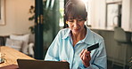 Happy woman, credit card and laptop with sale in home, flare and online shopping with financial freedom. Mature person, computer and fintech with digital banking, easy payment and e commerce at house
