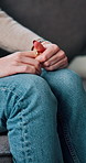 Hands, nervous tick and ring with woman in therapy session for mental health assessment or checkup. Coping mechanism, ptsd and trauma with patient on sofa for advice, appointment or psychology