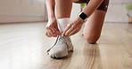 Fitness, hands and tie shoes in gym to start workout, training or exercise. Woman, athlete and tying footwear or sneakers for sport to get ready or prepare for cardio, health and wellness in club