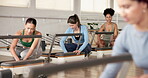 Pilates, start and reformer machine with women in studio for gym, workout and stability. Equipment check, wellness club and inspection with people in fitness class for setup, exercise and health