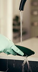 Washing, plate or hand with gloves at faucet by sink,  running water or clear dirt for hygiene practice. Service, home maintenance or housekeeper clean dish in kitchen, liquid or stop bacteria spread