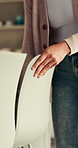 Hands, housekeeping and woman with chair, spring cleaning and chores with movement. Organize furniture, home and person with closeup, tidy and daily routine with dining table and maintenance