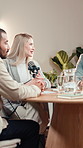 Woman, men and interview with mic for podcast at recording studio, business advice or content creation. People, influencer and host for broadcast, talk show or group with entrepreneurship tips on web