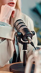 Podcast, mic and woman in studio talking for interview, broadcast and streaming radio show. Content creation, presenter and guest speaker with equipment for audio recording, conversation or questions